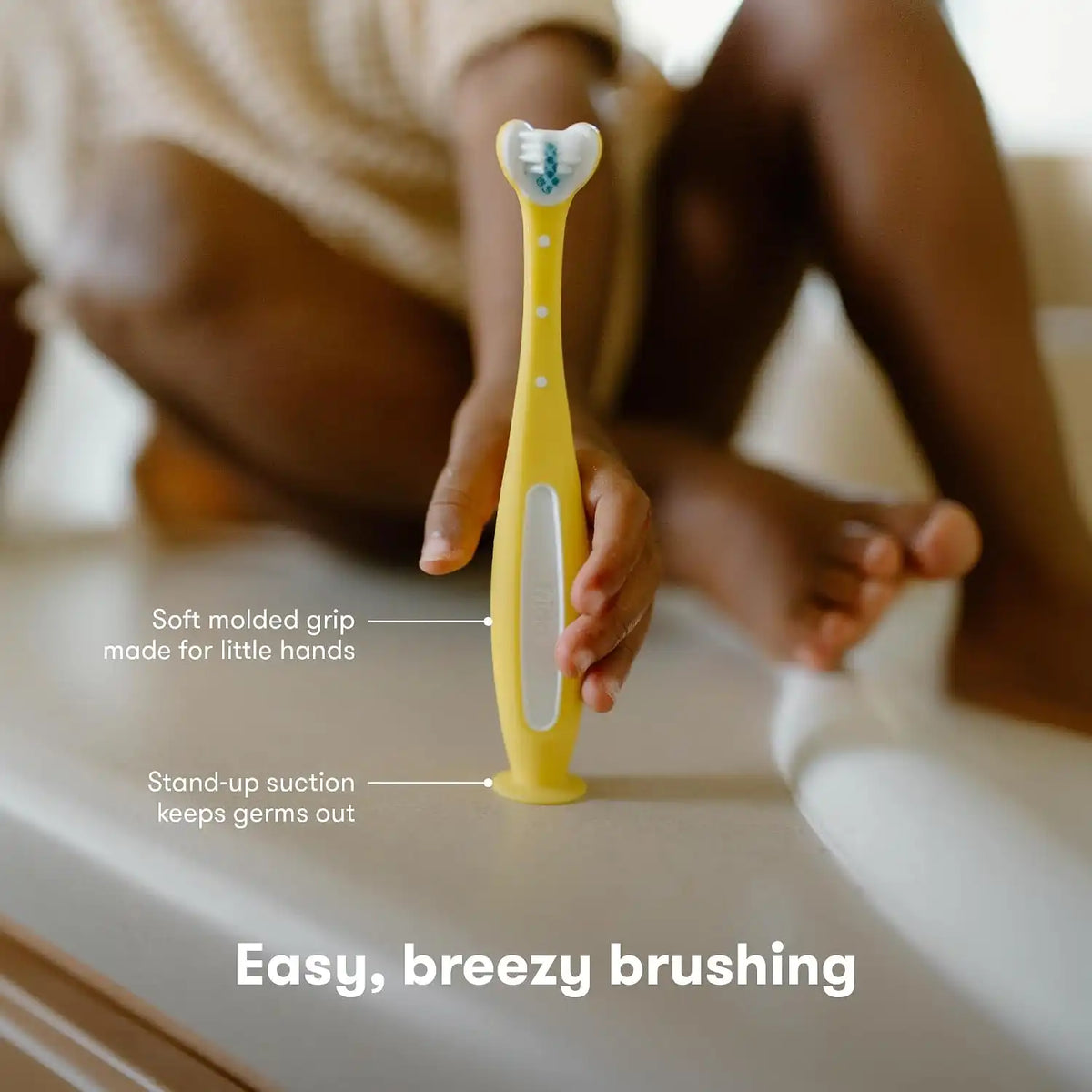 Frida Baby Triple-Angle Toothhugger Toddler Toothbrush, Soft, Yellow